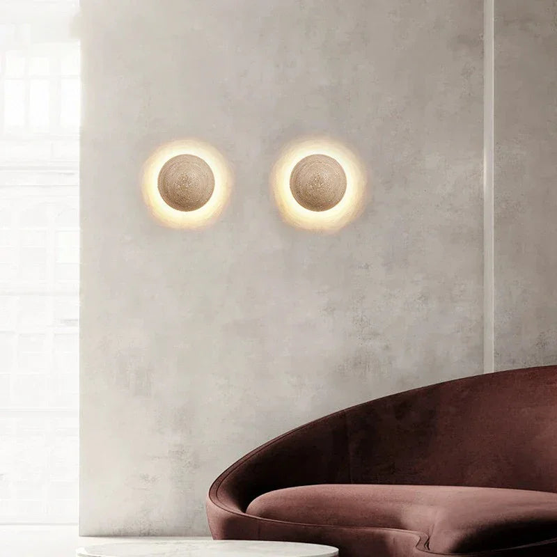 Round stone sphere wall light in a Japandi interior