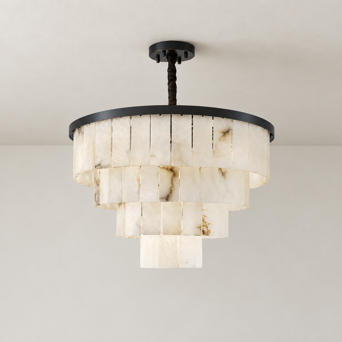 Black tiered alabaster chandelier unlit, showing natural stone panels and ceiling mounting.