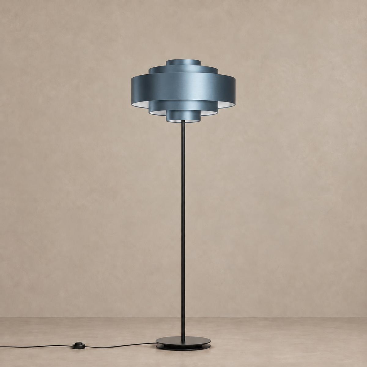 Blue CL85070M floor lamp with a stepped metal shade, black stem and round base.