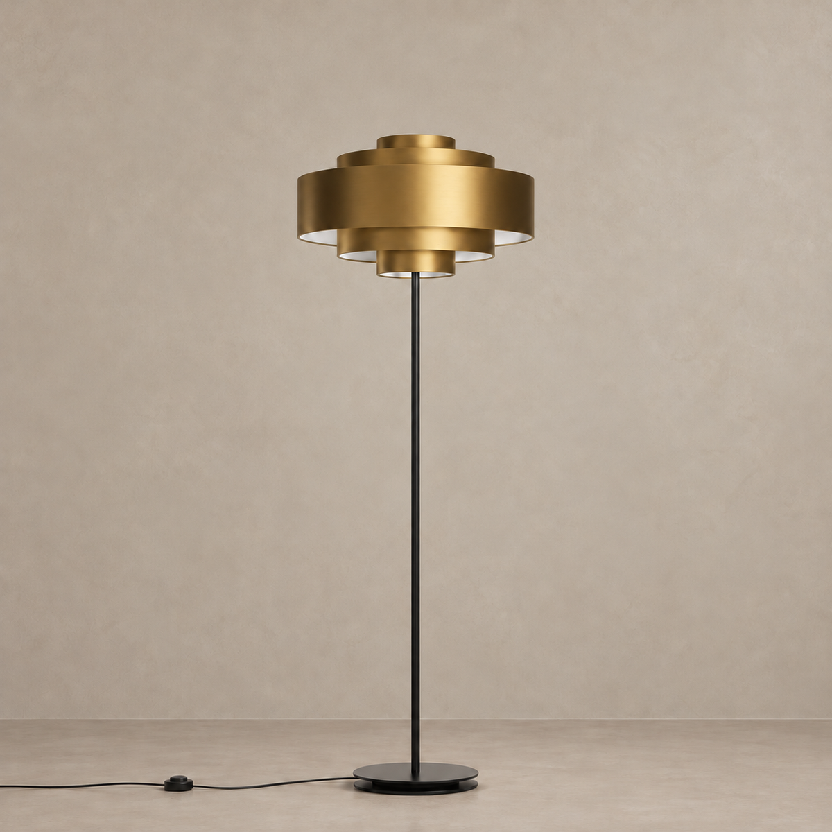 CL85070M floor lamp with an unlit tiered brass shade and black round base.