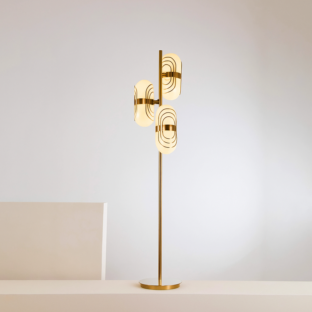 Gold floor lamp with modern design on a neutral background