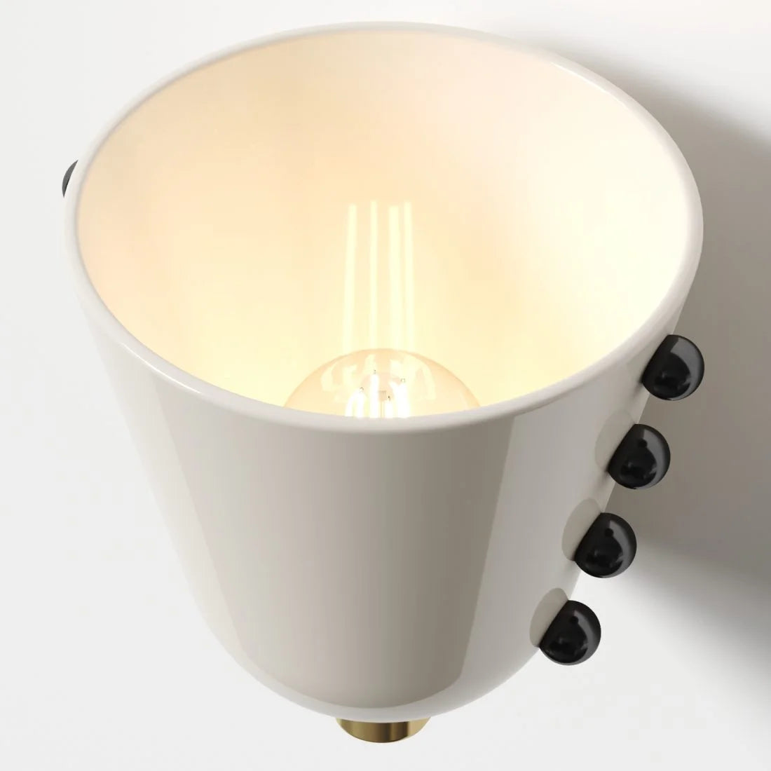 White and brass wall sconce full view